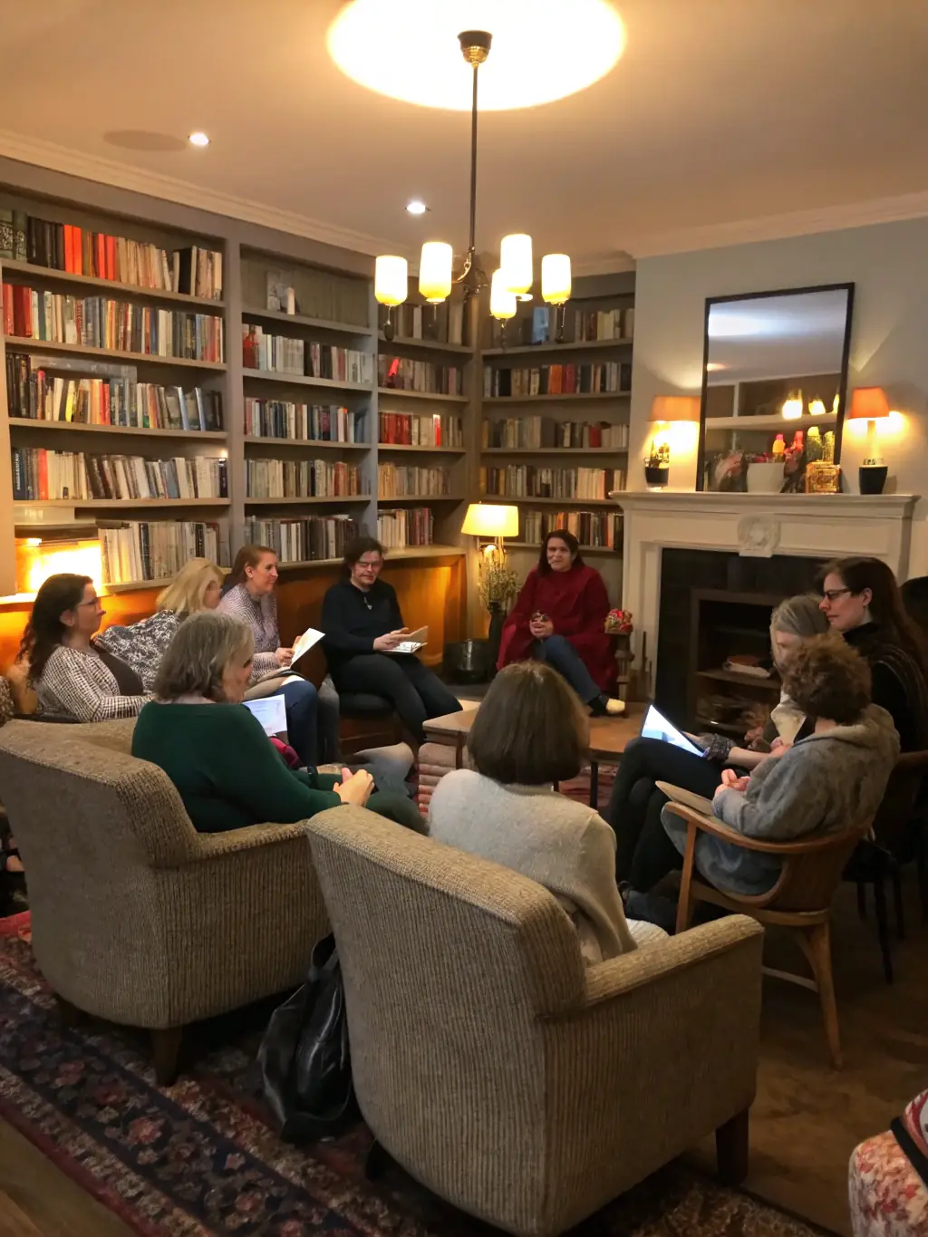 Seniors participating in a book club discussion, sharing their thoughts and insights on a selected novel in a cozy corner of the library.